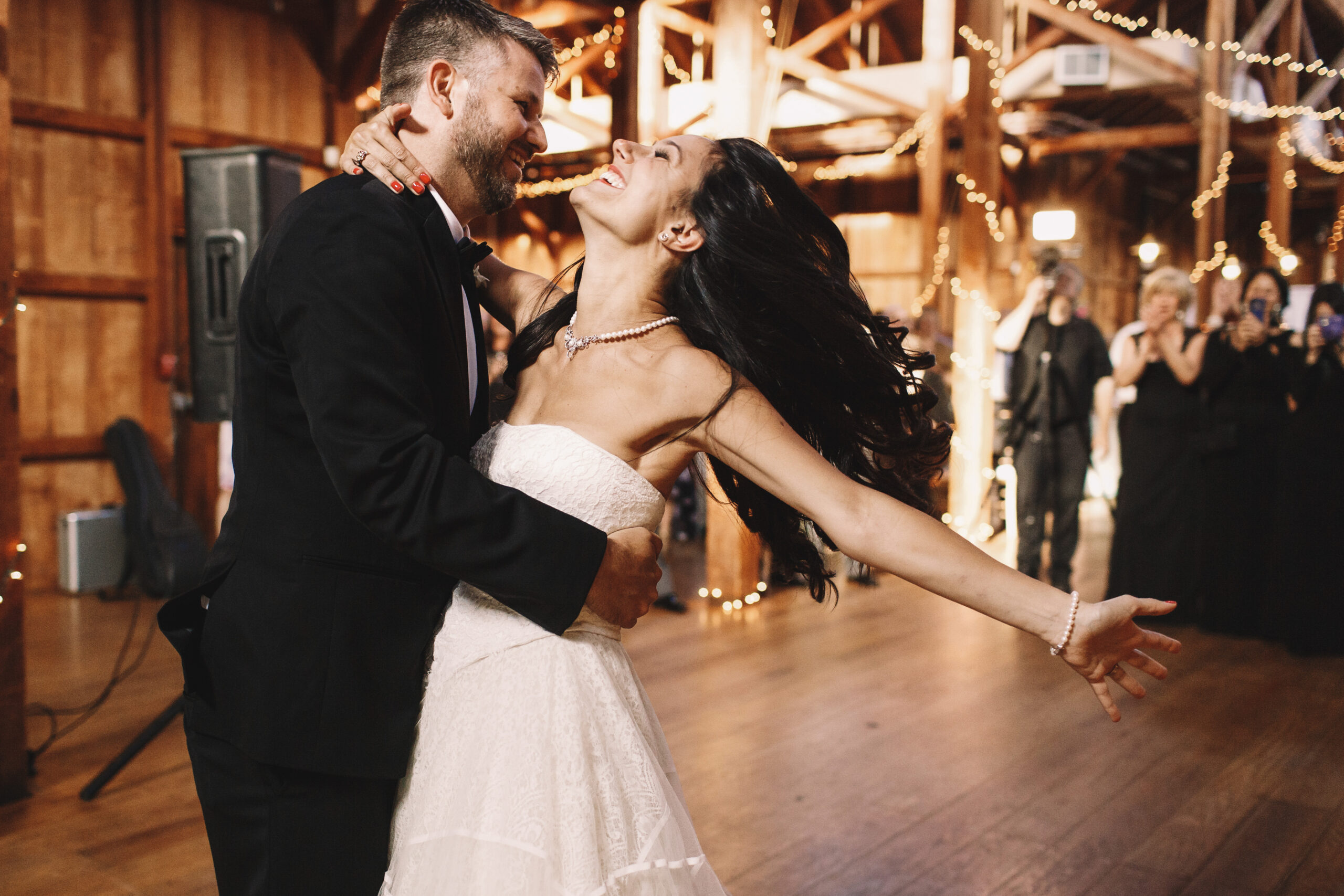 Bride and groom sharing their first dance at their wedding reception
