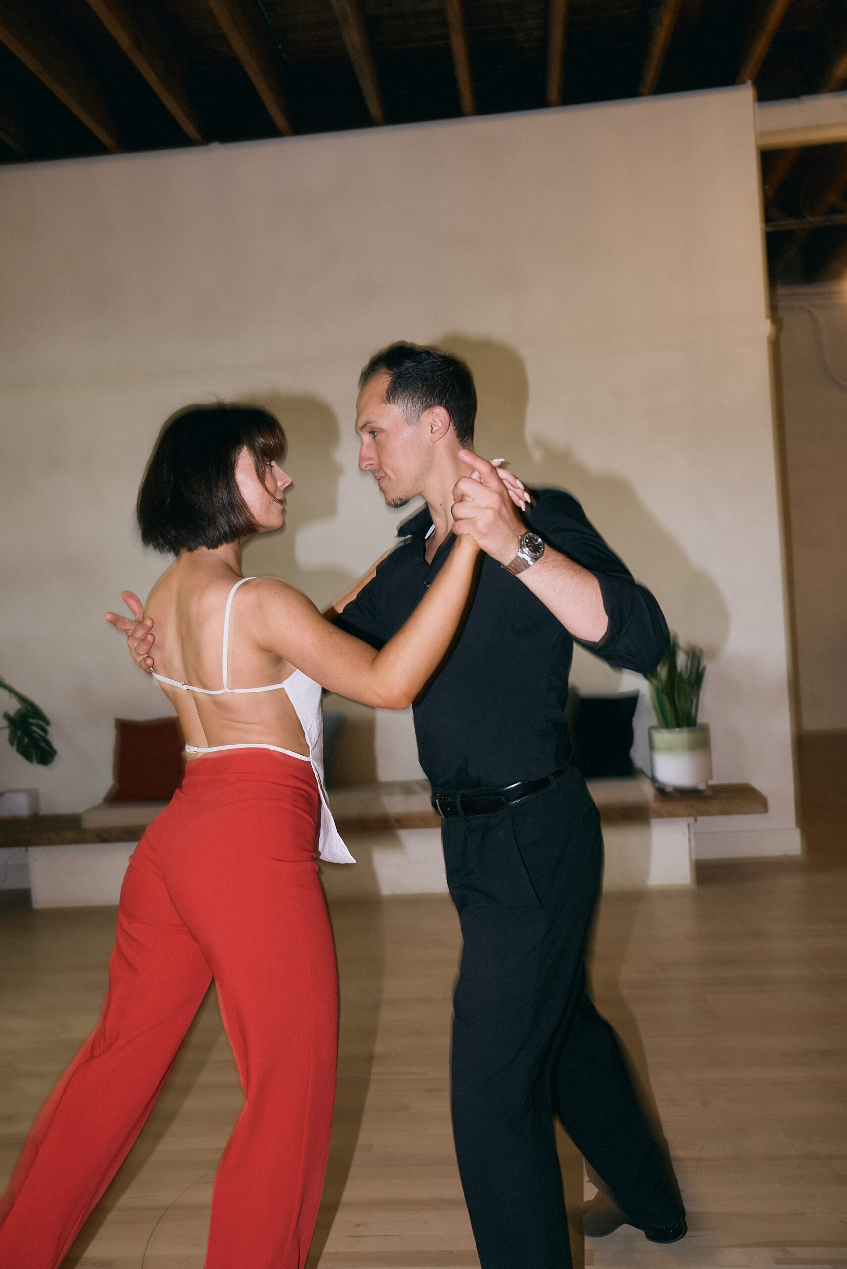 Couple dancing Bachata and Salsa at a Beach Ballroom social in Toronto's east end