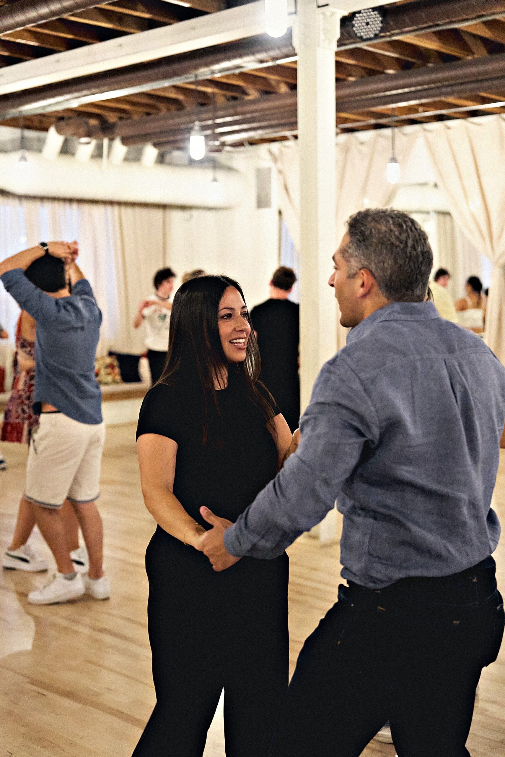 Couple dancing together at Beach Ballroom's Cinco de Mayo social in Toronto
