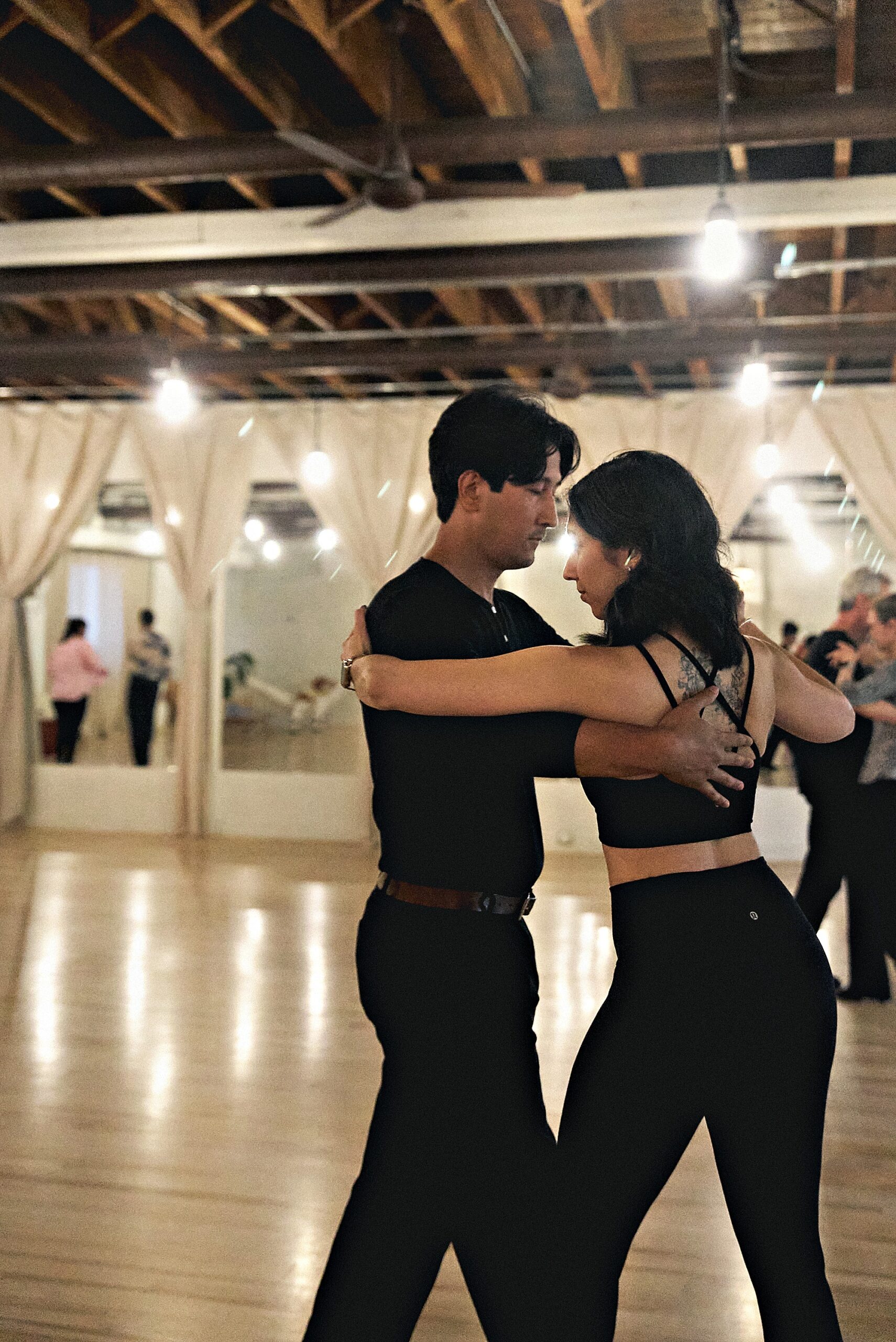 Couple dancing together at Beach Ballroom's Cinco de Mayo social in Toronto