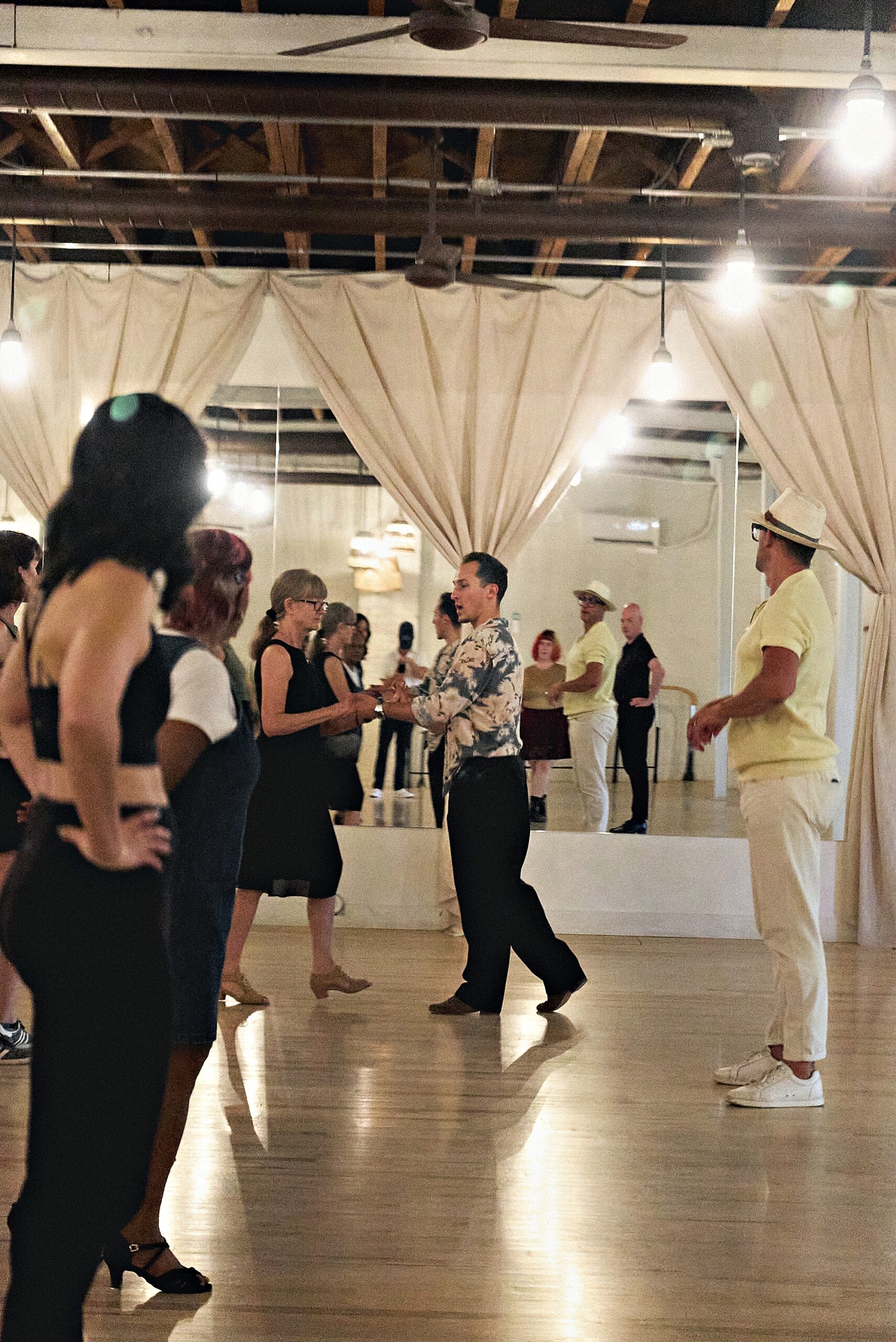 Couple dancing together at Beach Ballroom's Cinco de Mayo social in Toronto