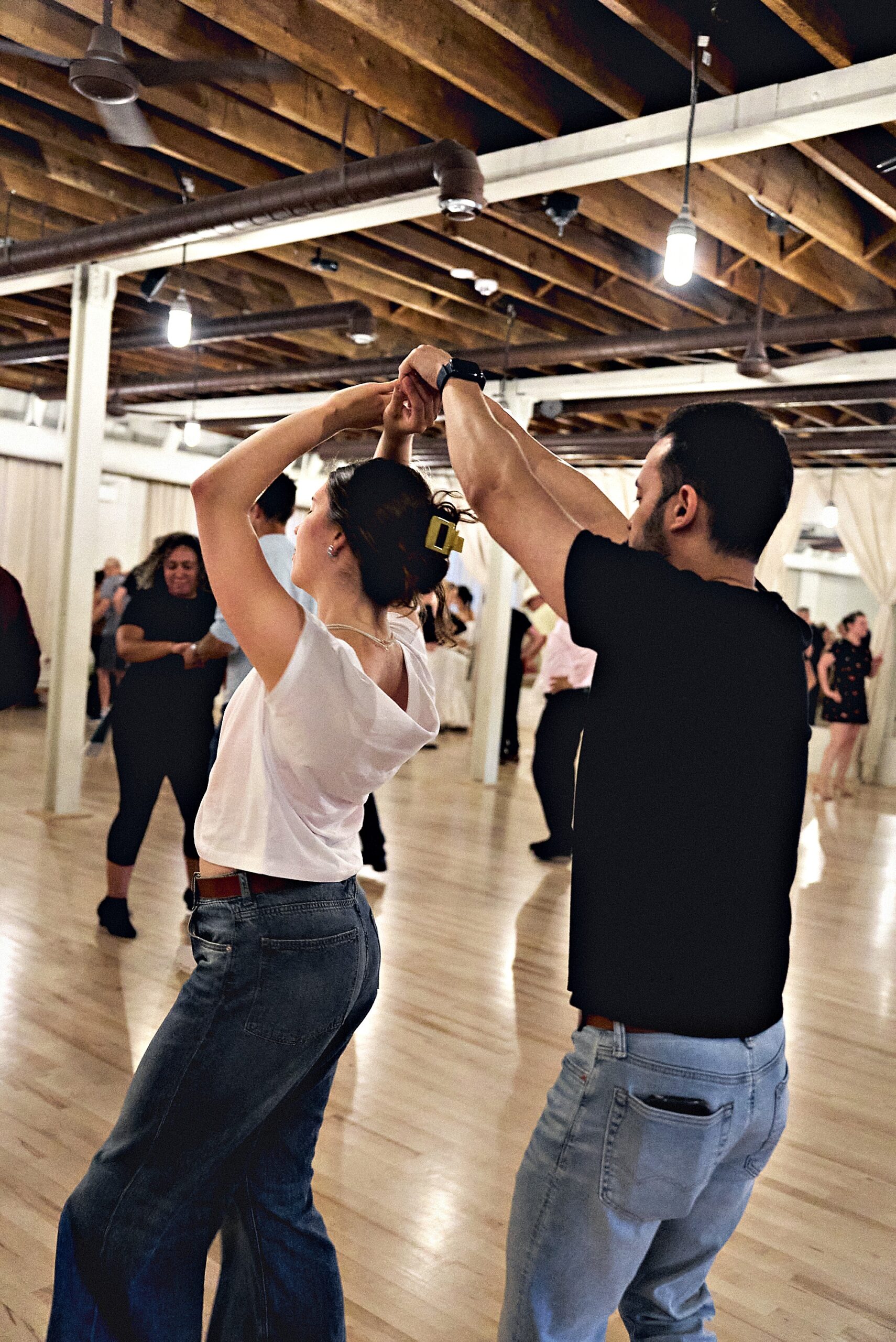Couple dancing together at Beach Ballroom's Cinco de Mayo social in Toronto