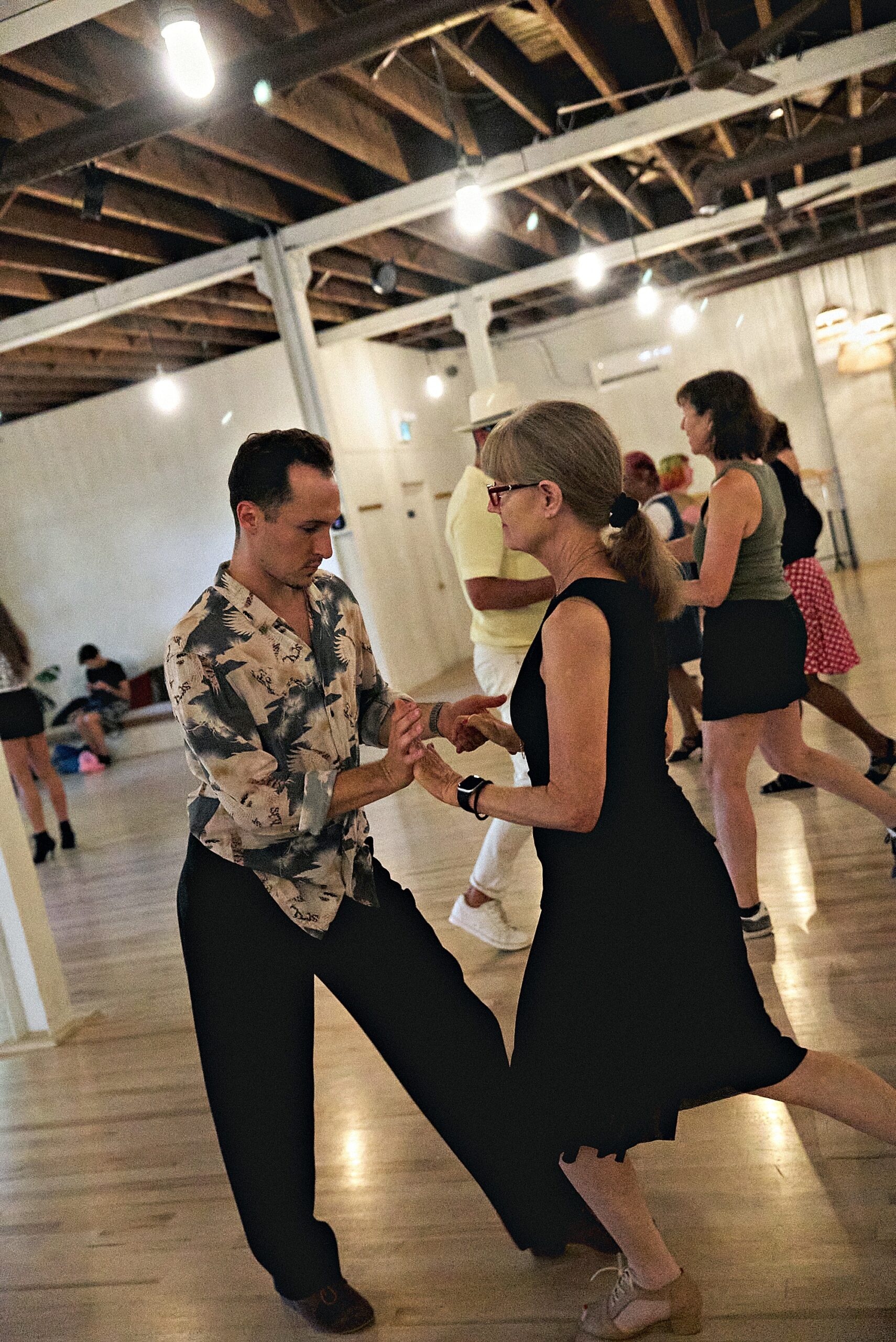 Group of guests dancing together at Beach Ballroom's Cinco de Mayo social in Toronto