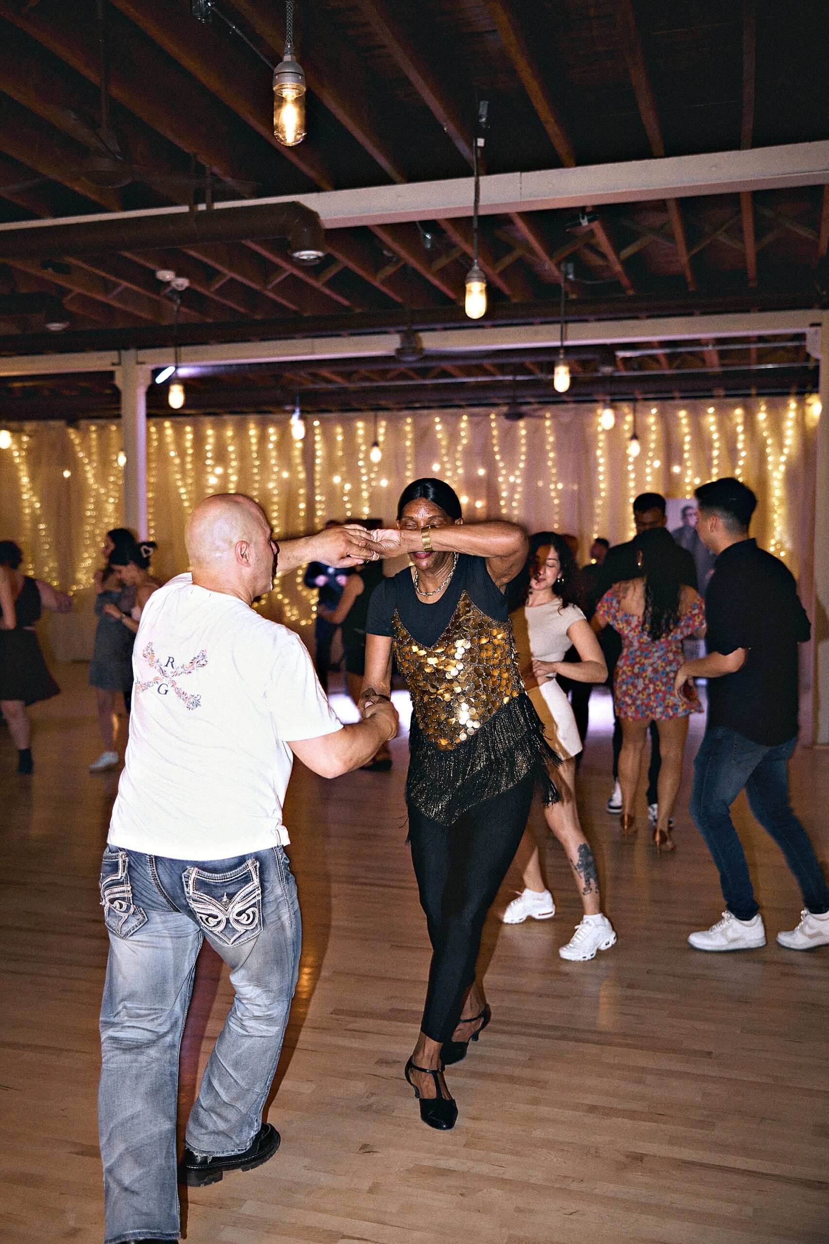 Couple dancing Salsa at a Beach Ballroom evening social in Toronto